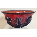 A Chinese 19th/20th century Beijing glass bowl Carved with four boys in blue on a red ground worked