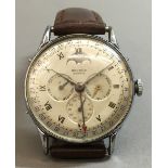 A Record Watch Company Datofix triple calendar gent's wristwatch The signed silvered dial with