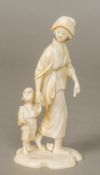 A late 19th/early 20th century Japanese carved ivory okimono Worked as a woman in traditional