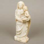 An 18th/19th century alabaster figural carving Modelled as the Virgin Mary and the Christ child,