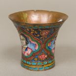 An 18th/19th century Qajar enamel decorated ghalian cup The fluted copper vessel decorated in the