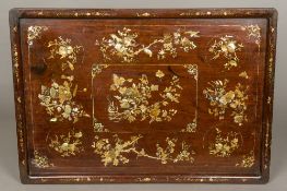 A 19th century Chinese mother-of-pearl inlaid hardwood (possibly hongmu) panel Profusely inlaid