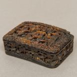 A 19th century Canton carved tortoiseshell snuff box Of arched rounded rectangular form,