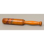 A 19th century wooden tip staff Of typical handled cylindrical form, painted with a crest.