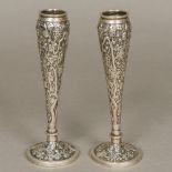 A pair of 19th century Chinese silver bud vases,