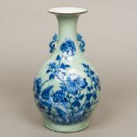 A 19th century Chinese celadon vase Of flared baluster form,
