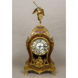 A large boulle bracket clock The domed top surmounted with a gilt bronze trumpeting angel,