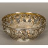 An early 20th century Danish Arts & Crafts pierced silver bowl Repousse decorated in the round with