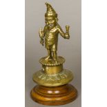 A Victorian brass Mr Punch bar top lighter Typically formed as Mr Punch with a cigar in his mouth