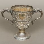 A Georgian Irish silver twin handled trophy cup, hallmarked Dublin, maker's mark of R.