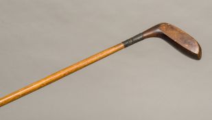 A Victorian Sunday stick Of typical golf club form, the shaft stamped E RAYNER. 90 cm high.