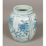 An Eastern blue and white porcelain vase Decorated with floral sprays. 15.5 cm high.