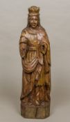 A Medieval style carving of a saint Modelled wearing a crown and in typical dress. 62 cm high.