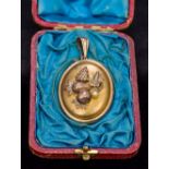 An unmarked Victorian photo pendant/brooch Of oval form,
