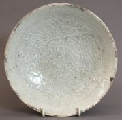 A Chinese Song porcelain bowl Typically worked with phoenixes and floral sprays with off white