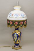 A large Murano overlay blue glass table lamp With florally painted milk and gilt heightened milk