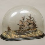 A model sailing ship diorama The main three masted vessel beside a single masted vessel and a