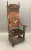 A 19th century Continental carved walnut open armchair The high back carved with twin shield