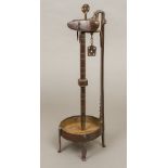 An early 19th century German/Austrian Crusie lamp Of typical burnished wrought iron form.