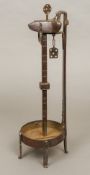 An early 19th century German/Austrian Crusie lamp Of typical burnished wrought iron form.