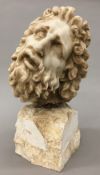 After the Antique Stone carving of a bearded man Mounted on a carved stone plinth base. 29 cm high.