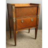 A 19th century Continental gilt metal mounted kingwood tambour front side cabinet The three quarter