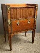 A 19th century Continental gilt metal mounted kingwood tambour front side cabinet The three quarter