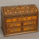A late 19th /early 20th century North African mother-of-pearl and specimen wood inlaid chest The