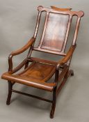 A late 19th century Chinese hardwood stargazing chair Of typical form,