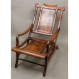 A late 19th century Chinese hardwood stargazing chair Of typical form,