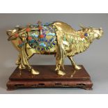 A Chinese Republic period 925 silver and gold washed figure of an ox Finely adorned with coloured