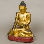 A large 18th century Chinese gilt bronze Buddha Typically modelled,