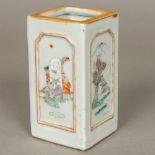 An 18th/19th century Chinese porcelain brush pot Of panelled square section form decorated with