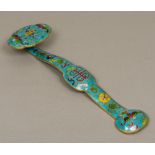 A Chinese cloisonne decorated ruyi sceptre Of typical form. 40 cm long.