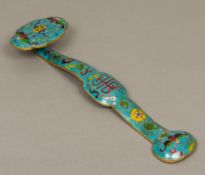 A Chinese cloisonne decorated ruyi sceptre Of typical form. 40 cm long.