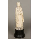 A large early 19th century Dieppe carved ivory figure Modelled as a woman in flowing bejewelled