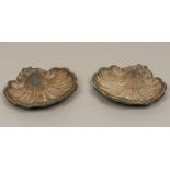 A pair of 19th century cast metal garden statuary decorations Scallop shell cast. 25 cm wide.