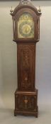 An Edwardian inlaid mahogany cased longcase clock The engraved brass dial with Arabic and Roman