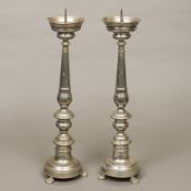 A pair of late 19th/early 20th century silver plated pricket sticks Of typical form,
