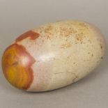 A large Shiva Lingam stone Of typical smooth river tumbled form (these stones are said to have