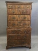 An 18th century walnut chest on chest The moulded canted rectangular top above an arrangement of