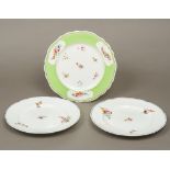 A pair of Chamberlains Worcester porcelain plates Decorated with floral sprays within moulded