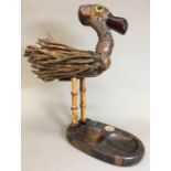 An early 20th century YZ bird novelty smoker's companion by Henry Howell & Co.