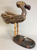 An early 20th century YZ bird novelty smoker's companion by Henry Howell & Co.
