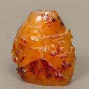 A Chinese carved agate snuff bottle