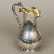 A Victorian silver jug, hallmarked Londo