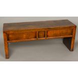 An 18th century Chinese hardwood low table Of small proportions,