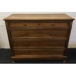 A 19th century French walnut commode The cleated rectangular moulded top above four straight
