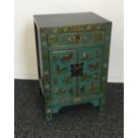 A chinoiserie lacquered pot cupboard and a similar side table