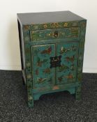 A chinoiserie lacquered pot cupboard and a similar side table